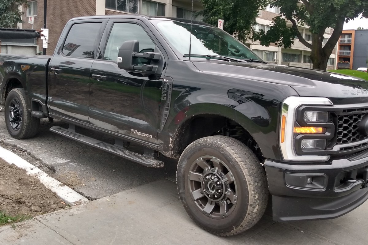 2023 Ford F-250 Super Duty crew cab pickup parked on a residential street